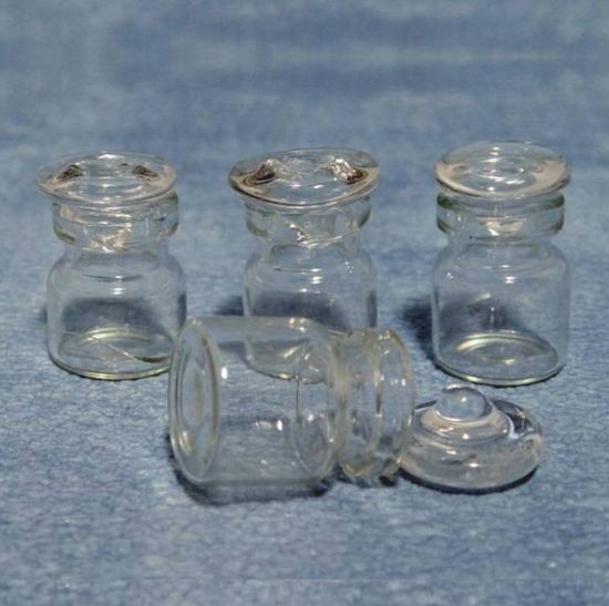 Set of 4 Glass Stopper Jars